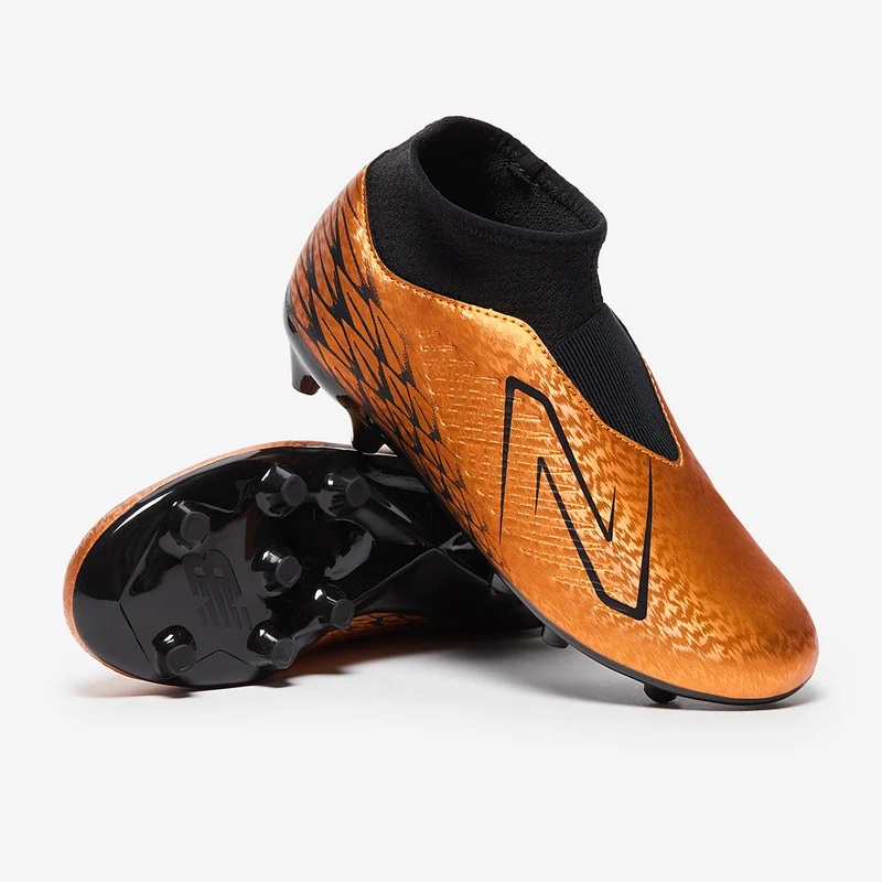 New Balance Tekela V4 Magique FG para niños